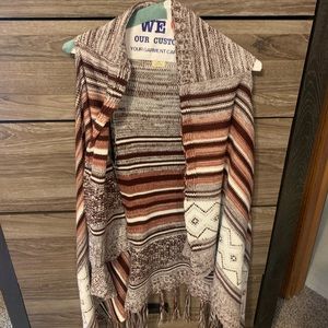 Long sleeveless vest